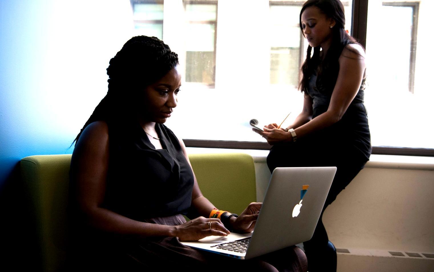 Behind-the-scenes view of video production setup with professional lighting and camera equipment